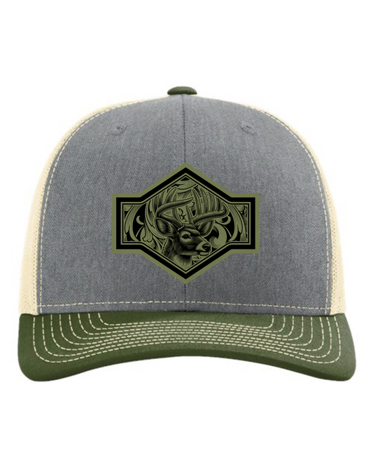 Cuztom Graphics buck trucker hat with gray front, green brim, and deer emblem embroidery