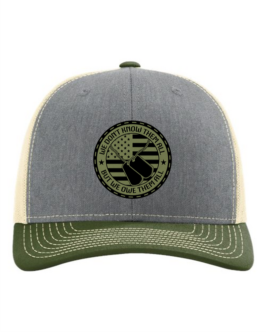 Cuztom Graphics We Owe Them All hat with gray front, olive green brim, and mesh back